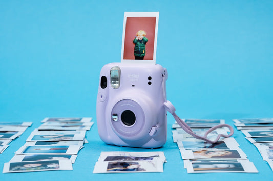 How Did the Instant Camera Impact Society and Photography?